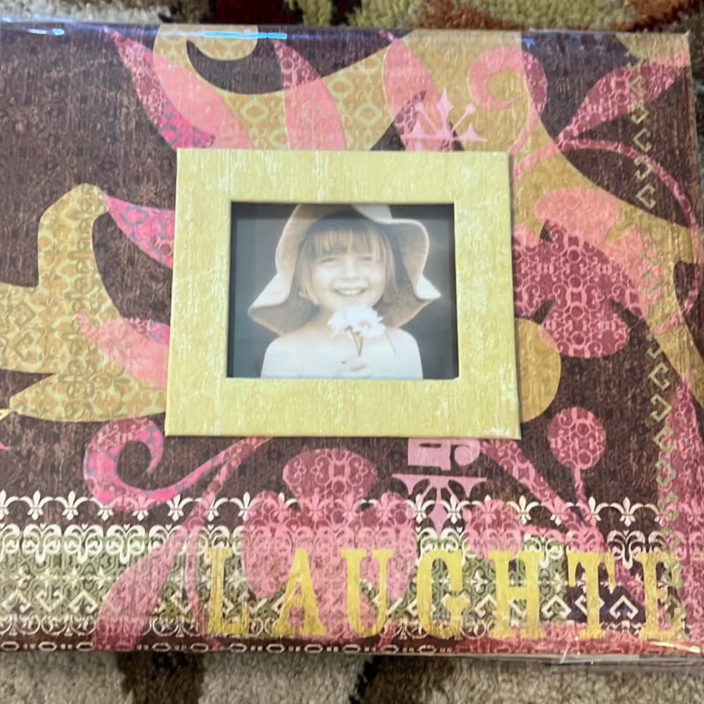 K&Company scrapbook includes stickers and decorative papers